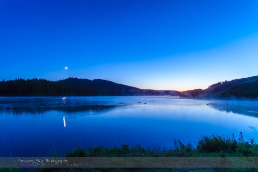 Moonset on a Misty Lake
