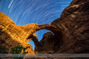 Star Trails Behind Double Arch