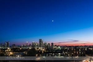 The waxing crescent Moon near Venus in the spring evening sky over the skyline of Calgary, Alberta, May 21, 2015. I shot this from Tom Campbell Hill near the Telus Spark science centre. This is a single exposure with the 16-35mm lens and Canon 60Da, shot as part of a 360-frame time-lapse sequence.