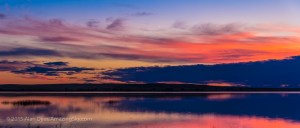 The waxing crescent Moon below Venus low in the sunset colours of a July summer evening over the waters of Little Fish Lake, in southern Alberta. Jupiter is at upper right but much fainter.  This is a 3-segment panorama taken with the Canon 60Da and 18-200mm Sigma zoom.