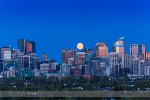 The Full Moon of July 31, 2015, an infamous “blue Moon”, the second Full Moon of July, rising over the skyline of Calgary, Alberta. This is one frame of a 480-frame time-lapse sequence taken with the Canon 60Da and 28-105mm lens. The location was Toronto Crescent.