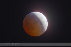 Total eclipse of the Moon, December 20/21, 2010, taken from home with 130mm AP apo refractor at f/6 and Canon 7D at ISO 400. An HDR composite of 9 images from 1/125 second to 2 seconds, composited in Photoshop CS5. Vibrancy increased to show bring out the colour variations across the shadow and at the edge of the shadow. Taken at about 12:21 am MST on Dec 21, about 20 minutes before totality began, during the partial phase.