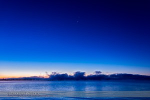The conjunction of Mars, Venus and Jupiter (from bottom to top) in the dawn sky over the misty waters of Lake Macgregor in southern Alberta, on October 28, 2015. This is a single 1/4-second exposure at f/4 and ISO 400 with the Canon 6D and 24mm Canon lens.