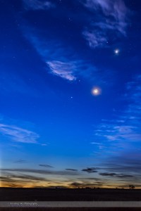 The waning crescent Moon, lit by Earthshine, with four planets on the morning of October 9, 2015, with the planets from bottom left to top right: • Mercury, just above the horizon between the low cloud bands, at lower left • Jupiter, bright at centre • Mars, reddish and above Jupiter • Venus, brightest at upper right and in some thin cloud.  The bright star Regulus in Leo is above and to the left of Venus. This is a blend of four exposures: a long 4-second exposure for most of the sky and ground and shorter 2, 1, amd 1/2 second exposures for the bright twilight area and around the Moon and Venus, to prevent those areas fro being blown out. Blending is with masks, not HDR. All with the Canon 6D at ISO 400 and 50mm Sigma lens at f/2.5